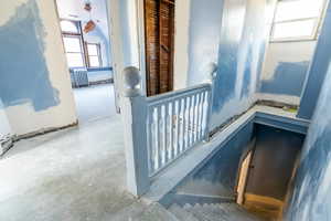 Staircase with radiator heating unit