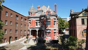 View of front of home with a chimney