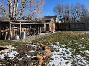 View of yard with an outbuilding