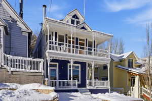 View of front of house with covered porch