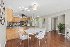 Dining room featuring dark wood finished floors
