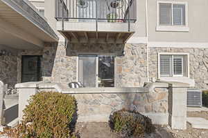 Covered patio with sliding glass doors