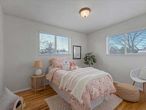 Bedroom with light wood-style flooring
