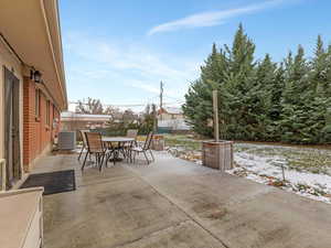 View of patio featuring outdoor dining area