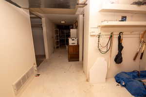 Mudroom with concrete flooring