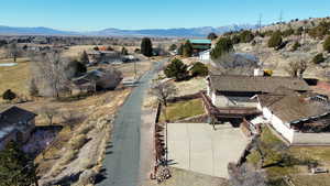 Aerial view of property's location with mountains
