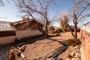 View of fenced backyard