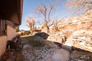 View of fenced backyard