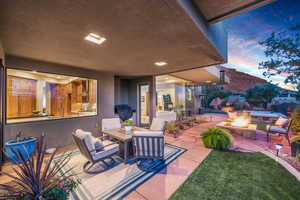 View of patio featuring an outdoor fire pit and outdoor dining space