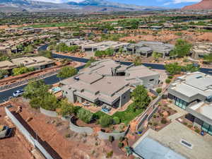 Aerial perspective of suburban area with a mountain backdrop