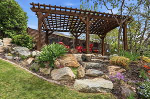 View of yard with a pergola