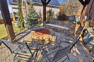 View of patio / terrace featuring a fire pit