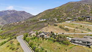Aerial perspective of suburban area with a mountain backdrop