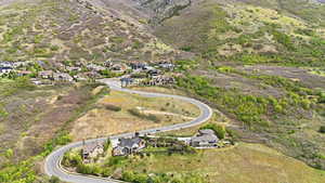 Aerial view of residential area featuring mountains