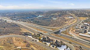 Aerial overview of property's location with a major roadway