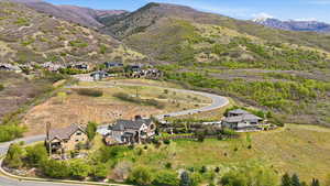 Aerial view of residential area with mountains