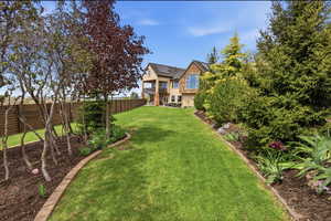 Fenced backyard featuring a patio area
