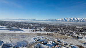 Snowy aerial view with a mountain view