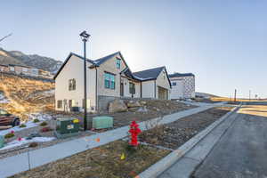 View of front of house featuring a mountain view