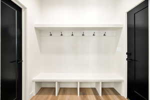 Mudroom with light wood-type flooring