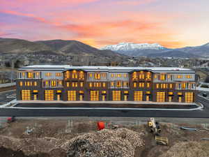 Rear view of property featuring a mountain view