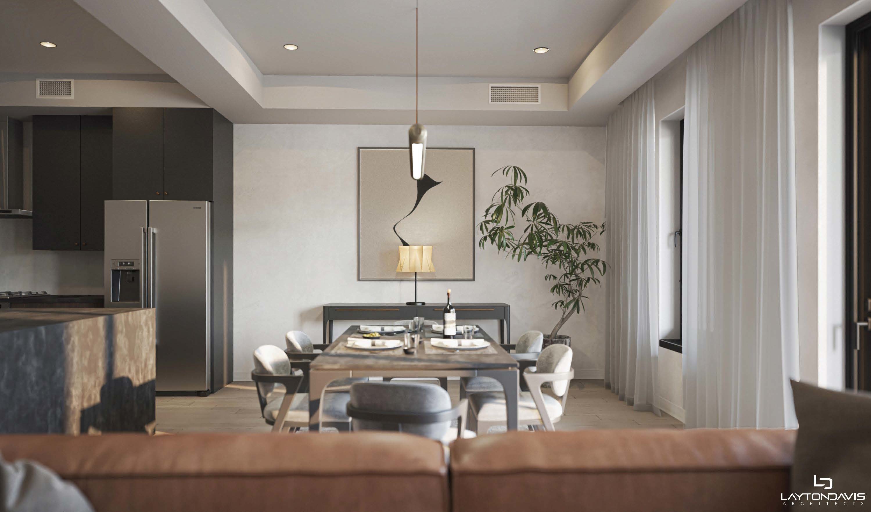 Living room featuring a tray ceiling, recessed lighting, and light wood-style floors