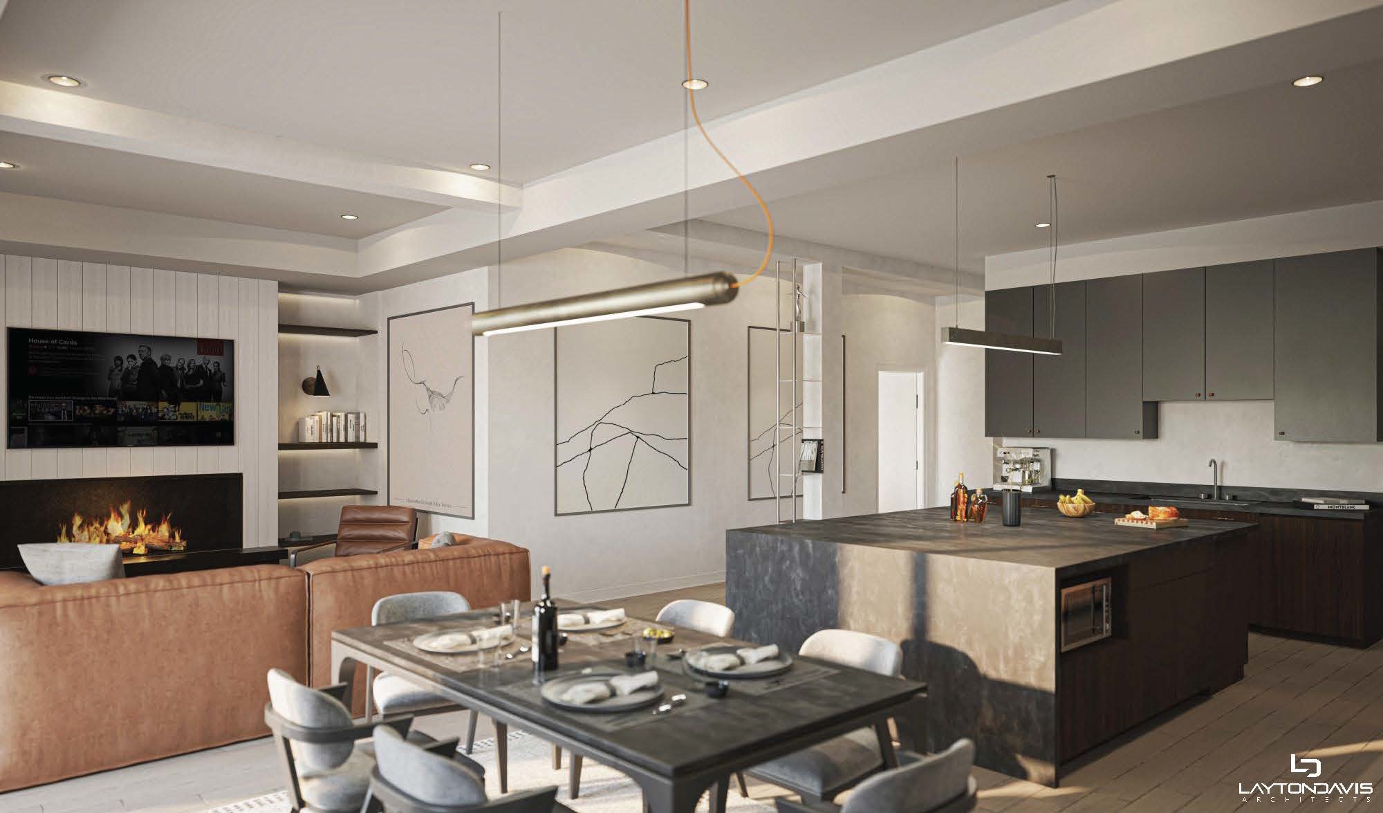 Dining room featuring light wood-style floors, a warm lit fireplace, and recessed lighting