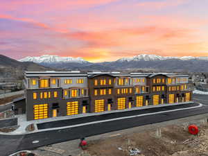 Back of house featuring a mountain view