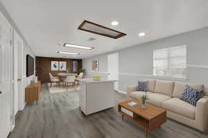 Virtually stage rec room/ family room in basement with brick fireplace