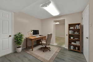 Flex room in basement virtually staged as an office