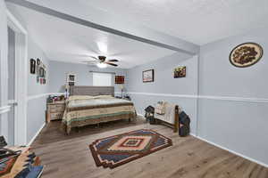 Bedroom in basement converted from 2 bedrooms into 1 large bedroom with a walk-in closet