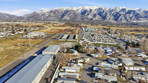 View of property location with nearby suburban area and a mountainous background