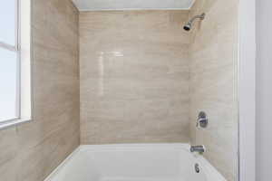 Bathroom with shower / bath combination