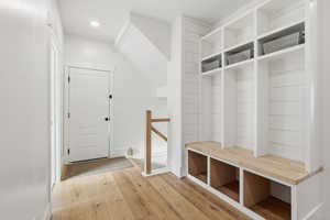 Mudroom with light wood-style flooring