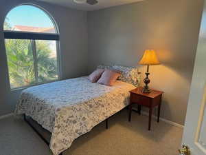 Bedroom featuring carpet and a ceiling fan