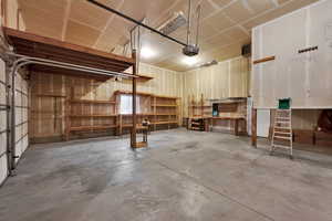 Garage featuring a garage door opener