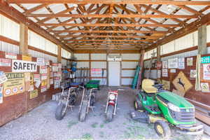 Garage featuring metal wall
