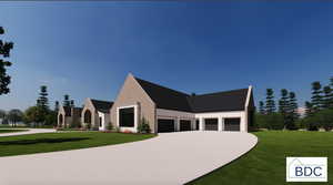 View of front of home featuring a front lawn, concrete driveway, and stucco siding