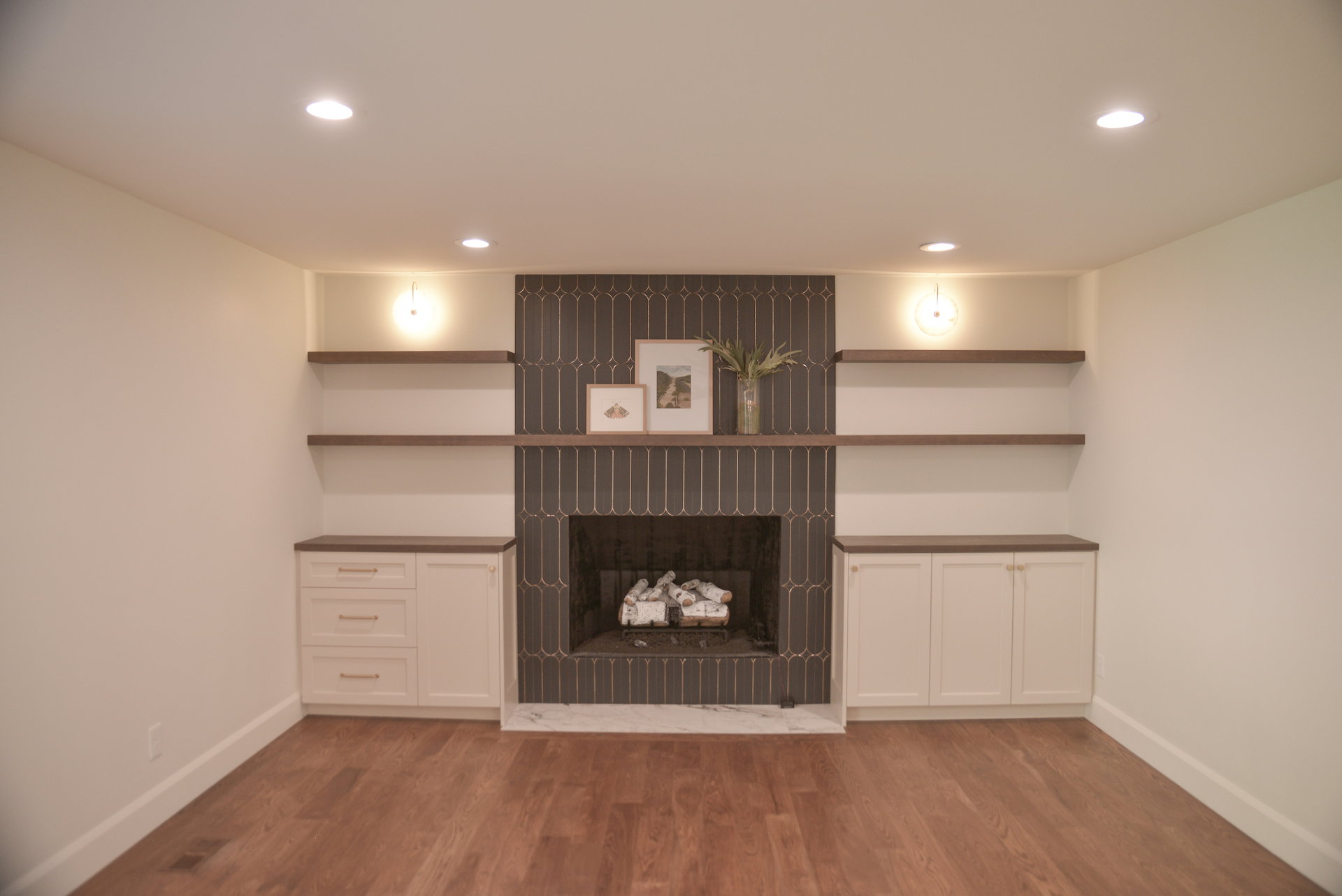Unfurnished living room featuring a fireplace, light wood-style floors, and recessed lighting