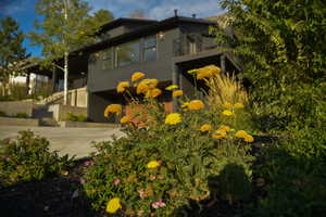 View of home's exterior featuring a balcony