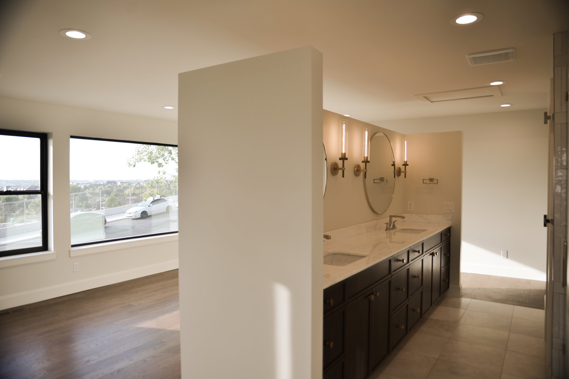 Full bath with double vanity and recessed lighting