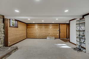 Below grade area with wood walls