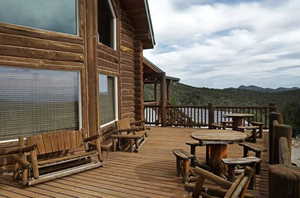 Wooden deck featuring a mountain view