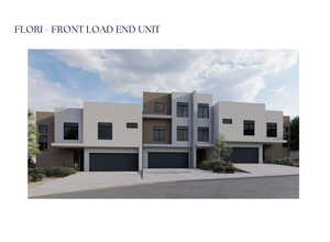 Contemporary home featuring stucco siding, a garage, and driveway