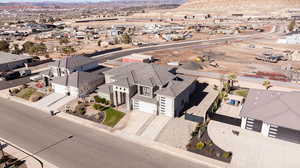 Aerial perspective of suburban area with a mountain backdrop