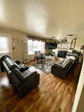 Living room featuring wood finished floors