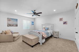 Bedroom featuring carpet floors, recessed lighting, and ceiling fan