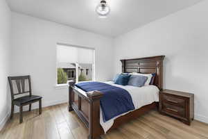 Bedroom with light wood finished floors