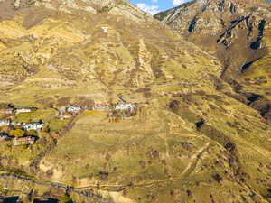 Overview of rural landscape featuring a mountain backdrop