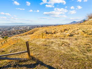 View of mountain backdrop featuring rural landscape